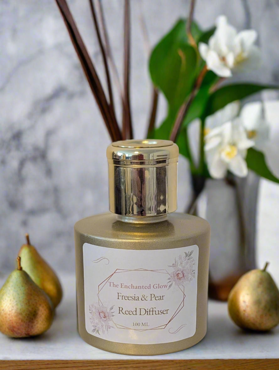 Freesia and Pear Reed Diffuser bottle with decorative pears and floral background.